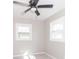 Bright bedroom with a ceiling fan and plenty of natural light at 2741 Mars Hill St, Indianapolis, IN 46241