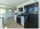 Modern kitchen with stainless steel appliances and lots of natural light at 2741 Mars Hill St, Indianapolis, IN 46241
