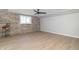 Inviting space with stone accent wall and light-colored floors at 2741 Mars Hill St, Indianapolis, IN 46241