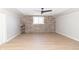 Bright room featuring stone accent wall and light-colored floors at 2741 Mars Hill St, Indianapolis, IN 46241