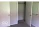 Bedroom closet view with doors open, providing storage space and a neat interior at 2823 N Gladstone Ave, Indianapolis, IN 46218