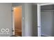 View of an open bedroom closet, showing the layout and dimensions of the space at 2823 N Gladstone Ave, Indianapolis, IN 46218