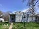 Charming single-story home featuring horizontal siding, a front window, and a well-maintained lawn at 2823 N Gladstone Ave, Indianapolis, IN 46218