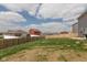 Large backyard with a wooden fence, offering privacy and space for outdoor activities at 2960 W Patchwork Dr, Monrovia, IN 46157