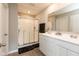 Bathroom featuring a glass shower and double sink vanity with ample counter space at 2960 W Patchwork Dr, Monrovia, IN 46157