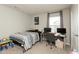 Neutral-toned bedroom with dedicated workspace for study or hobbies at 2960 W Patchwork Dr, Monrovia, IN 46157