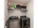 Convenient laundry room with modern front load washer and dryer, plus ample storage at 2960 W Patchwork Dr, Monrovia, IN 46157