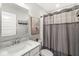 Bathroom features include granite counters, white vanity, and shower-tub combination with tasteful decor at 3527 Brampton Ln, Westfield, IN 46074