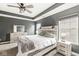 Charming bedroom with a ceiling fan, dresser and window with great natural light at 3527 Brampton Ln, Westfield, IN 46074