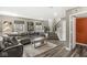 Inviting living room featuring stylish decor and staircase access at 3527 Brampton Ln, Westfield, IN 46074