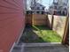 Backyard featuring a small grassy area and a wood privacy fence at 359 N Jefferson St, Martinsville, IN 46151