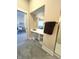 Bathroom with a large vanity, mirror, shower, and view to a bedroom at 359 N Jefferson St, Martinsville, IN 46151