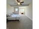 Bedroom featuring two big windows, neutral carpet, ceiling fan, and modern fixtures at 359 N Jefferson St, Martinsville, IN 46151