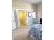Bright bedroom with an ensuite bathroom and exterior door at 359 N Jefferson St, Martinsville, IN 46151