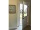 Inviting entryway with an inspirational art piece and a view to the outdoors at 359 N Jefferson St, Martinsville, IN 46151