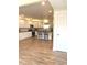 Bright kitchen featuring white cabinets, a kitchen island, and stainless steel appliances at 359 N Jefferson St, Martinsville, IN 46151