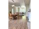 Open-concept living and dining room with hardwood floors and modern lighting at 359 N Jefferson St, Martinsville, IN 46151