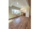 Open living room with large windows, new flooring and neutral walls at 359 N Jefferson St, Martinsville, IN 46151