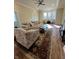 Bright living room featuring a bay window, ceiling fan, and stylish furniture at 359 N Jefferson St, Martinsville, IN 46151