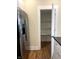 Spacious walk-in pantry with ample shelving, next to the stainless steel refrigerator at 359 N Jefferson St, Martinsville, IN 46151