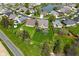 Aerial view of a property with a large yard near a pond in a well-planned community at 4309 Summerhaven Dr, New Palestine, IN 46163