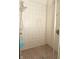 Bathroom features a tiled shower with a shower head at 4309 Summerhaven Dr, New Palestine, IN 46163