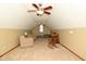 A large bonus room with neutral carpet, a ceiling fan, and natural light perfect for relaxing or entertaining at 4309 Summerhaven Dr, New Palestine, IN 46163
