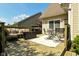 A spacious deck with a cushioned sofa and table set, providing an ideal outdoor entertainment and relaxation space at 4309 Summerhaven Dr, New Palestine, IN 46163