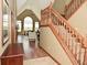 Welcoming entryway showcasing a staircase and open view into the living area at 4309 Summerhaven Dr, New Palestine, IN 46163