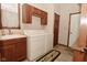 Bright laundry room with washer, dryer, sink and cabinets at 4309 Summerhaven Dr, New Palestine, IN 46163
