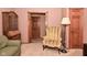Living room with classic decor including a striped chair and wooden hutch at 4309 Summerhaven Dr, New Palestine, IN 46163
