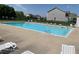 Outdoor community pool with lounge chairs offers a refreshing escape for residents at 4309 Summerhaven Dr, New Palestine, IN 46163