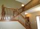 Grand staircase with beautiful wood banisters and railing at 4309 Summerhaven Dr, New Palestine, IN 46163