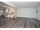 Finished basement with a wet bar, modern fixtures and lighting and wood-look flooring at 4415 Voyageur Way, Carmel, IN 46074