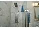 Luxurious bathroom with rainfall showerhead and marble tiling at 4415 Voyageur Way, Carmel, IN 46074