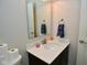 Modern bathroom featuring a clean vanity and mirror at 4415 Voyageur Way, Carmel, IN 46074
