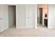 Hallway view with bedrooms and hall bath at 4415 Voyageur Way, Carmel, IN 46074