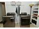 Functional laundry area with modern washer and dryer, and ample storage at 4415 Voyageur Way, Carmel, IN 46074