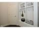 Functional mudroom with built-in shelving, hooks, and bench, perfect for organization at 4415 Voyageur Way, Carmel, IN 46074
