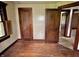 The bedroom showcases hardwood floors, wood trim, and neutral wall colors offering a blend of comfort and charm at 505 W 40Th St, Indianapolis, IN 46208