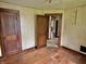 This bedroom features hardwood floors, wood trim, and neutral wall colors for an inviting, classic feel at 505 W 40Th St, Indianapolis, IN 46208