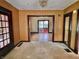 Spacious room showcasing multiple doorways and a clear view into a sunlit room beyond at 505 W 40Th St, Indianapolis, IN 46208