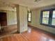 Inviting living room showcasing hardwood floors, light-toned walls, and multiple windows at 505 W 40Th St, Indianapolis, IN 46208
