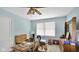 Bedroom with natural light, a ceiling fan, and furniture, providing potential for personalization and comfort at 5196 N London Rd, Fairland, IN 46126