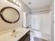 Bathroom featuring a tub with shower, cabinet, and vanity with mirror at 5397 Ripplingbrook Way, Carmel, IN 46033