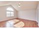 Vaulted primary bedroom with lots of sunlight and beautiful hardwood floors at 5397 Ripplingbrook Way, Carmel, IN 46033