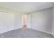 Neutral bedroom featuring a closet, neutral paint, and carpet at 5397 Ripplingbrook Way, Carmel, IN 46033