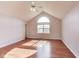 Vaulted primary bedroom with lots of sunlight and beautiful hardwood floors at 5397 Ripplingbrook Way, Carmel, IN 46033
