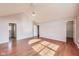 Vaulted primary bedroom with lots of sunlight and beautiful hardwood floors plus an en suite bathroom at 5397 Ripplingbrook Way, Carmel, IN 46033