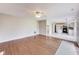 Spacious living room with hardwood floors that connects the main hall and eat-in kitchen at 5397 Ripplingbrook Way, Carmel, IN 46033